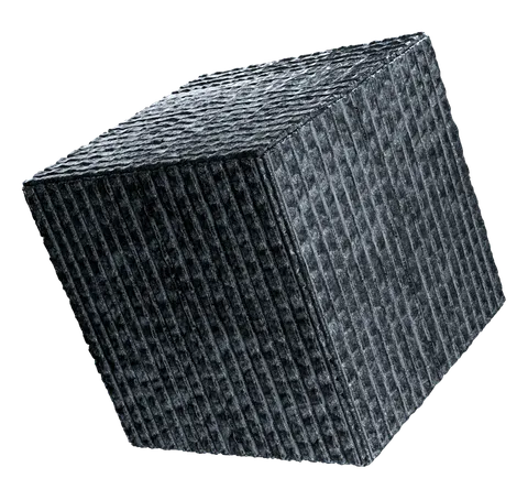 Large-format slabs of graphite-black granite are split by hand directly at the quarry: the texture of each slab and the pattern of each face are unique.